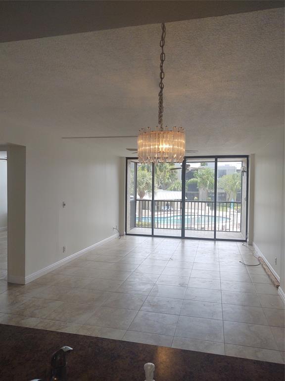 9 Royal Palm Way, Unit 201 Boca Raton, FL 33432 - Photo 5 of 21 a view of an empty room with a window