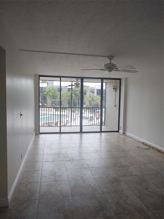 9 Royal Palm Way, Unit 201 Boca Raton, FL 33432 - Photo 6 of 21 a view of an empty room with a balcony