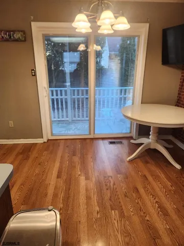 a view of a living room and bathroom