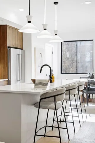 a kitchen with a stove and cabinets