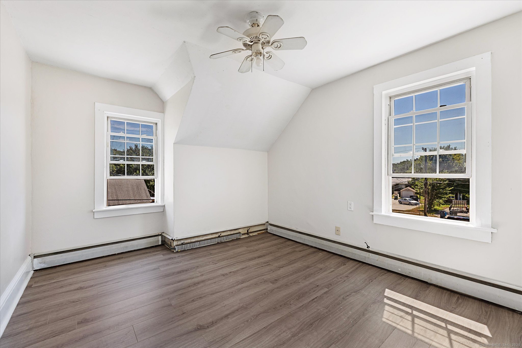 42-44 Church Street Plainfield, CT 06354 - Photo 17 of 36 wooden floor in an empty room with a window