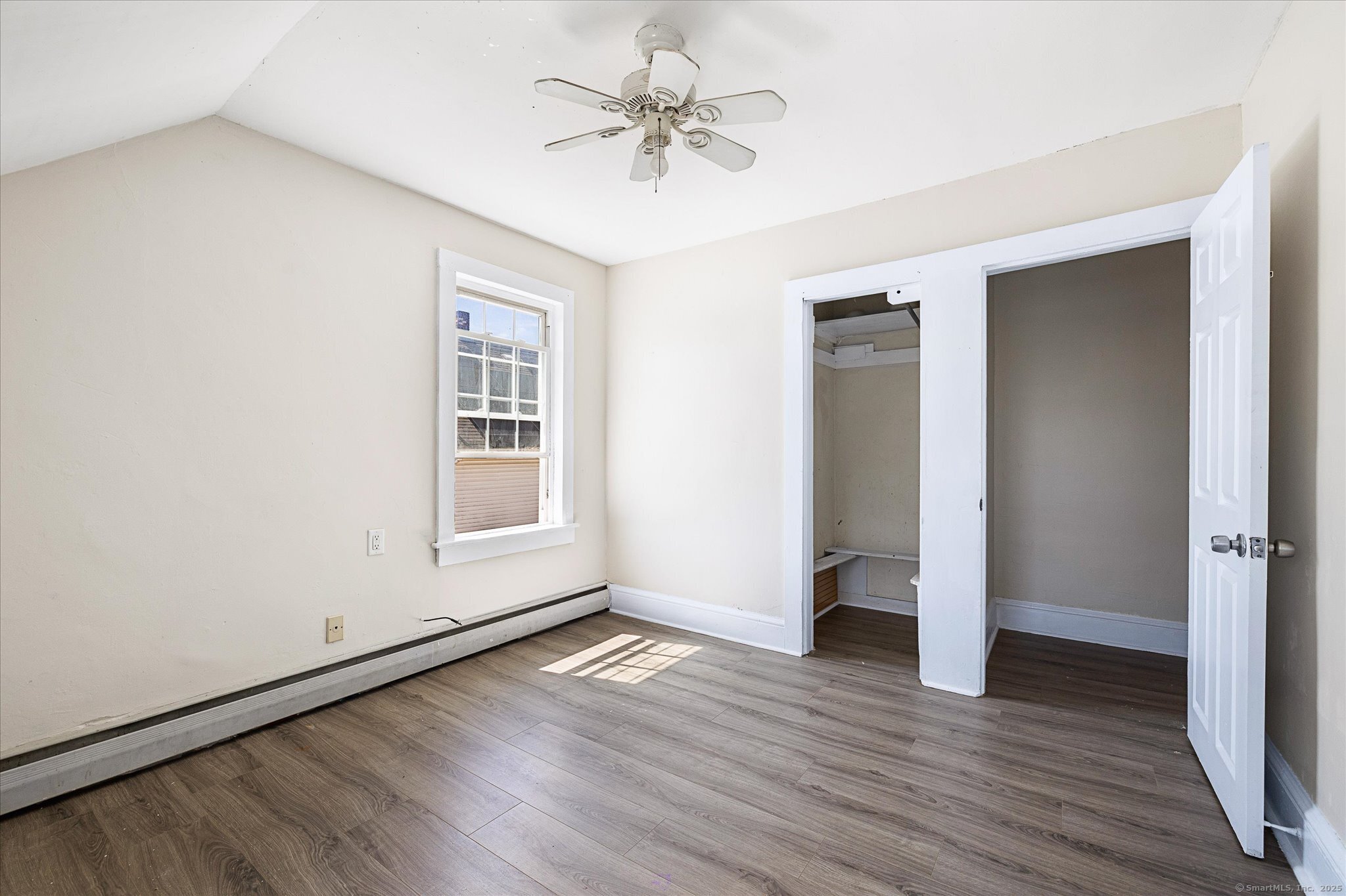 42-44 Church Street Plainfield, CT 06354 - Photo 18 of 36 wooden floor in an empty room with a window
