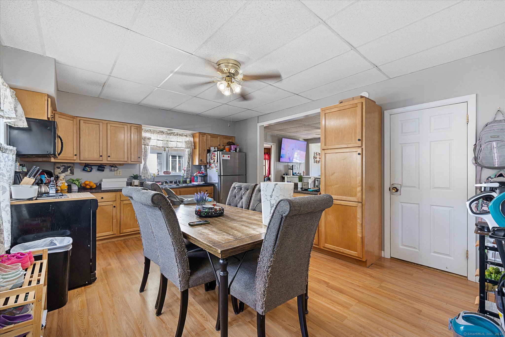 42-44 Church Street Plainfield, CT 06354 - Photo 23 of 36 a view of a dining room with furniture and wooden floor