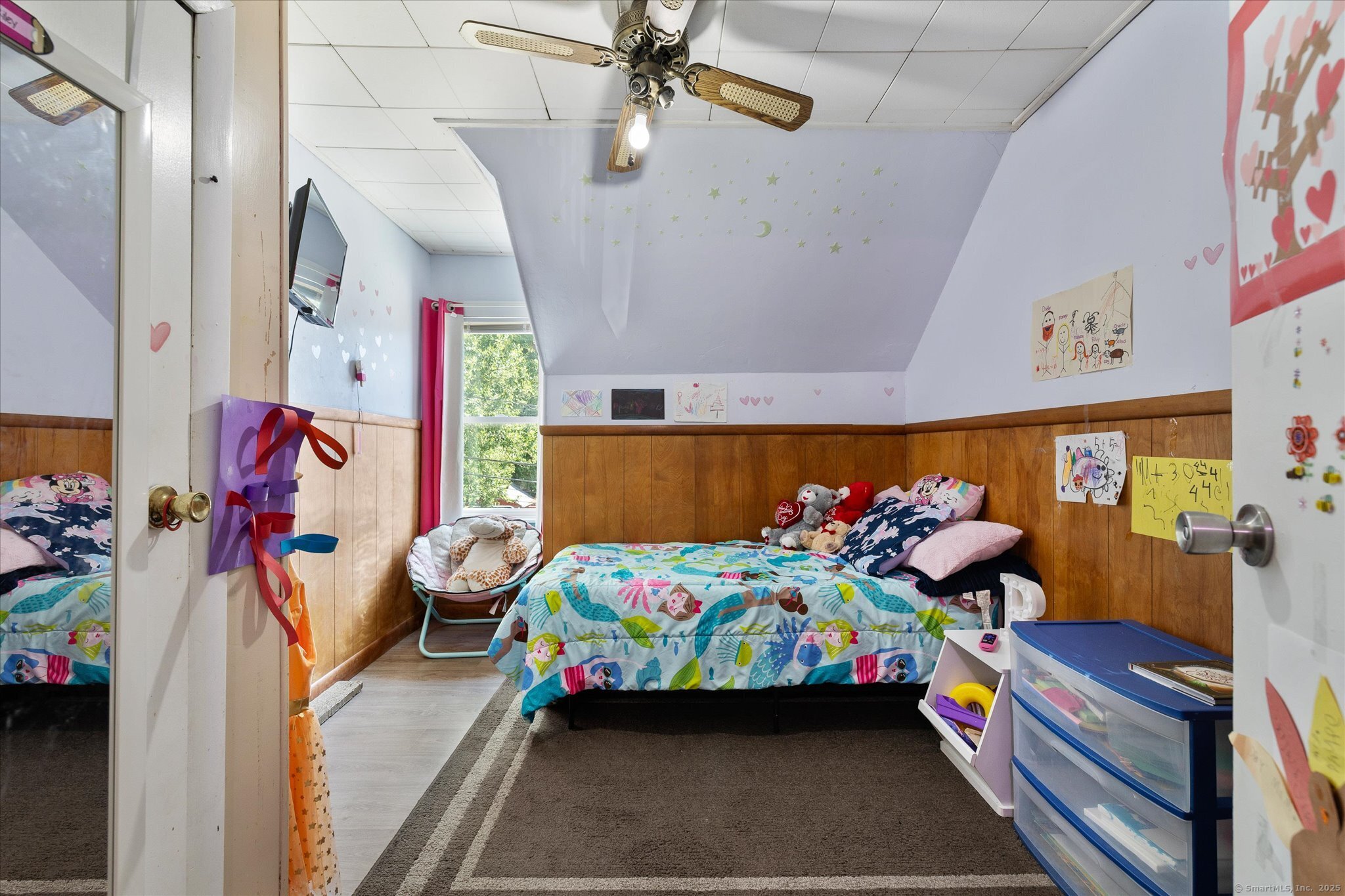 42-44 Church Street Plainfield, CT 06354 - Photo 29 of 36 a bedroom with a bed and a baby crib