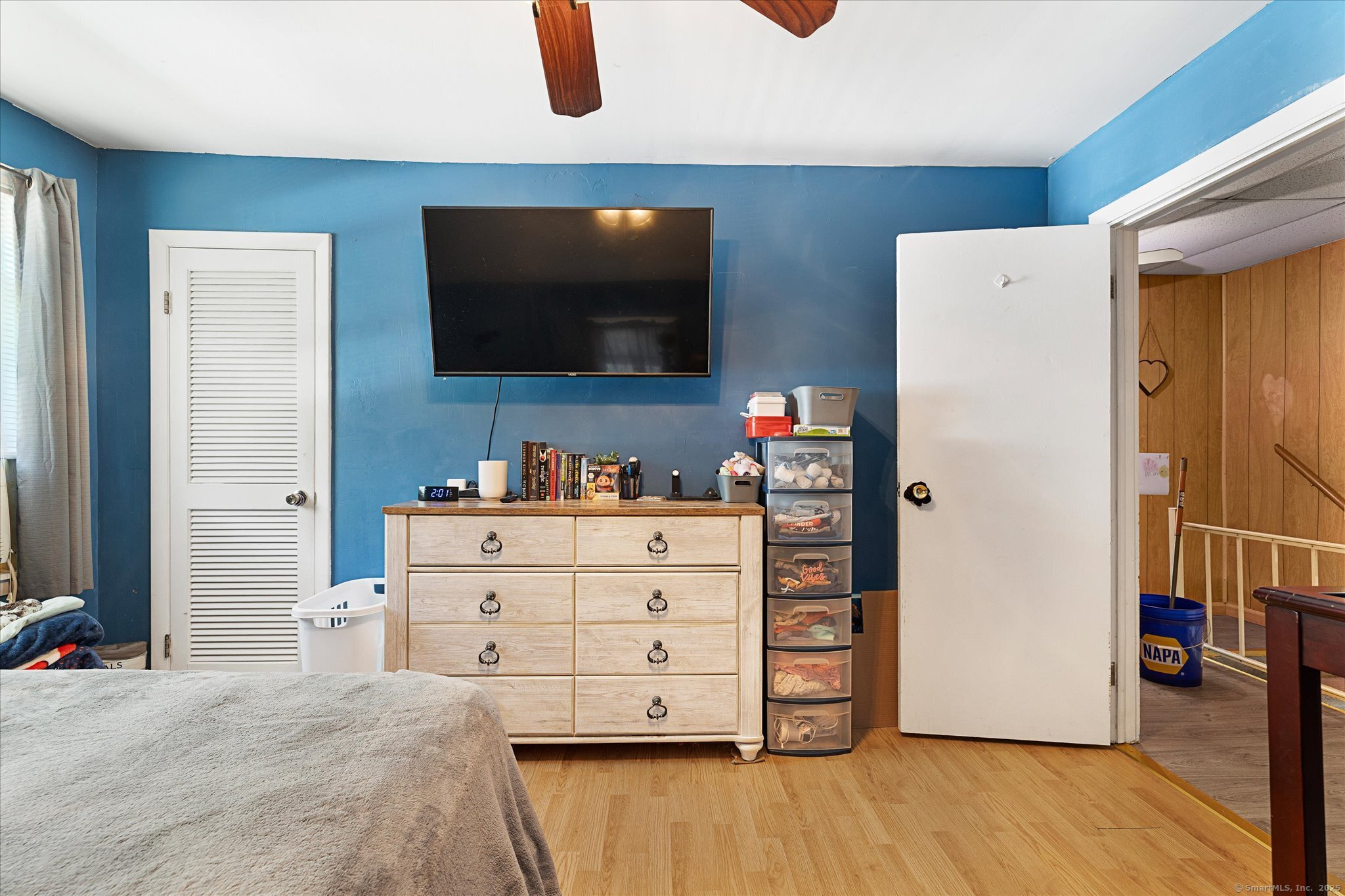 42-44 Church Street Plainfield, CT 06354 - Photo 33 of 36 a bedroom with a bed and a flat screen tv