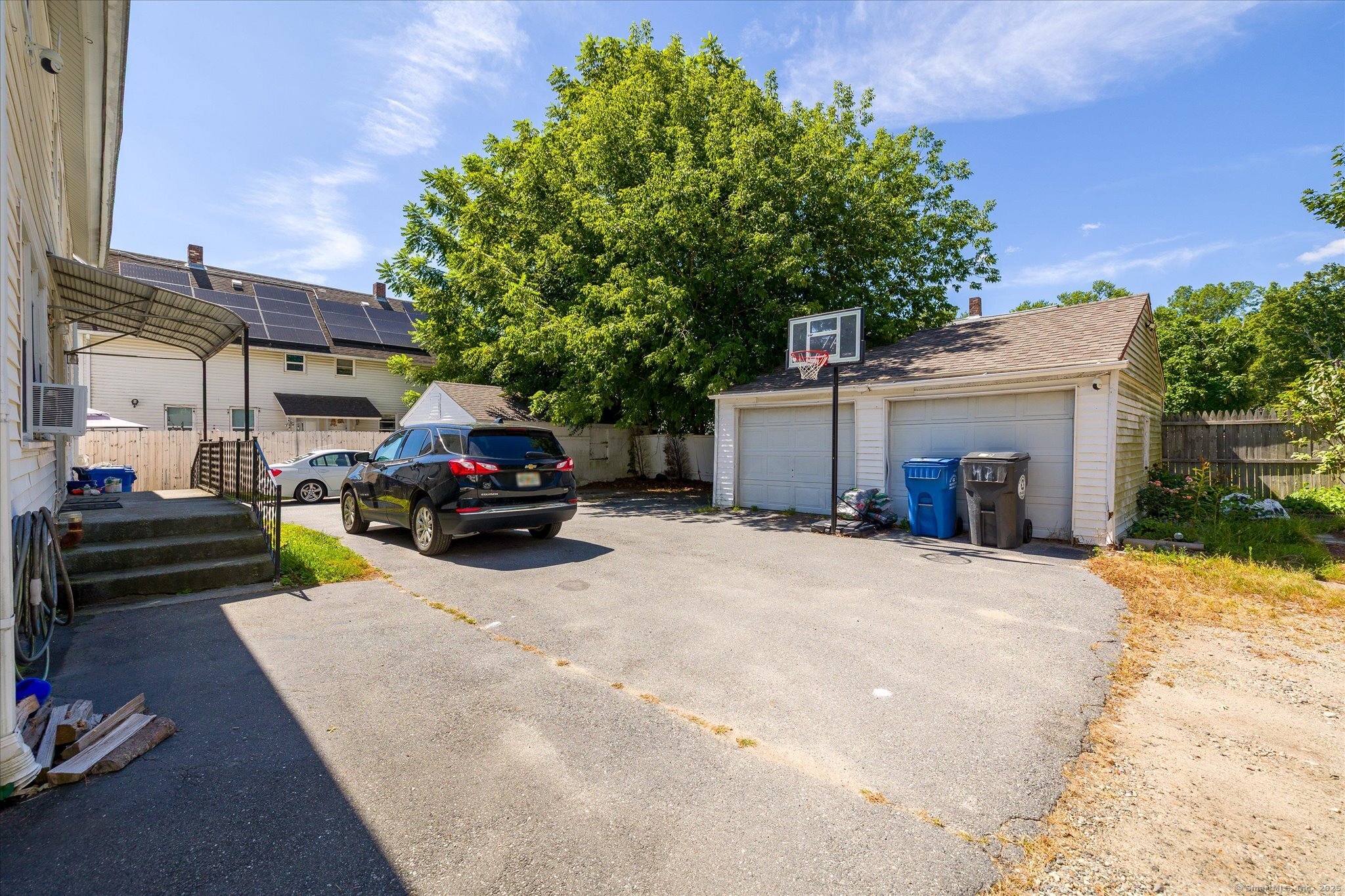 42-44 Church Street Plainfield, CT 06354 - Photo 6 of 36 a car parked in front of a house