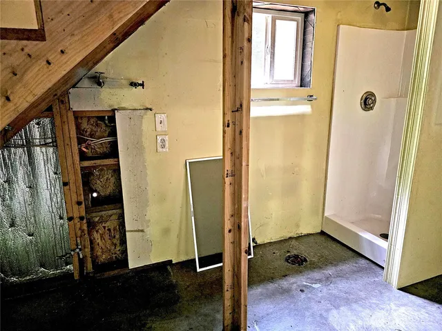 a view of a bathroom with a shower