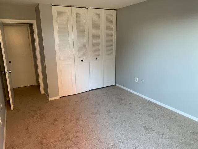 an empty room with closet