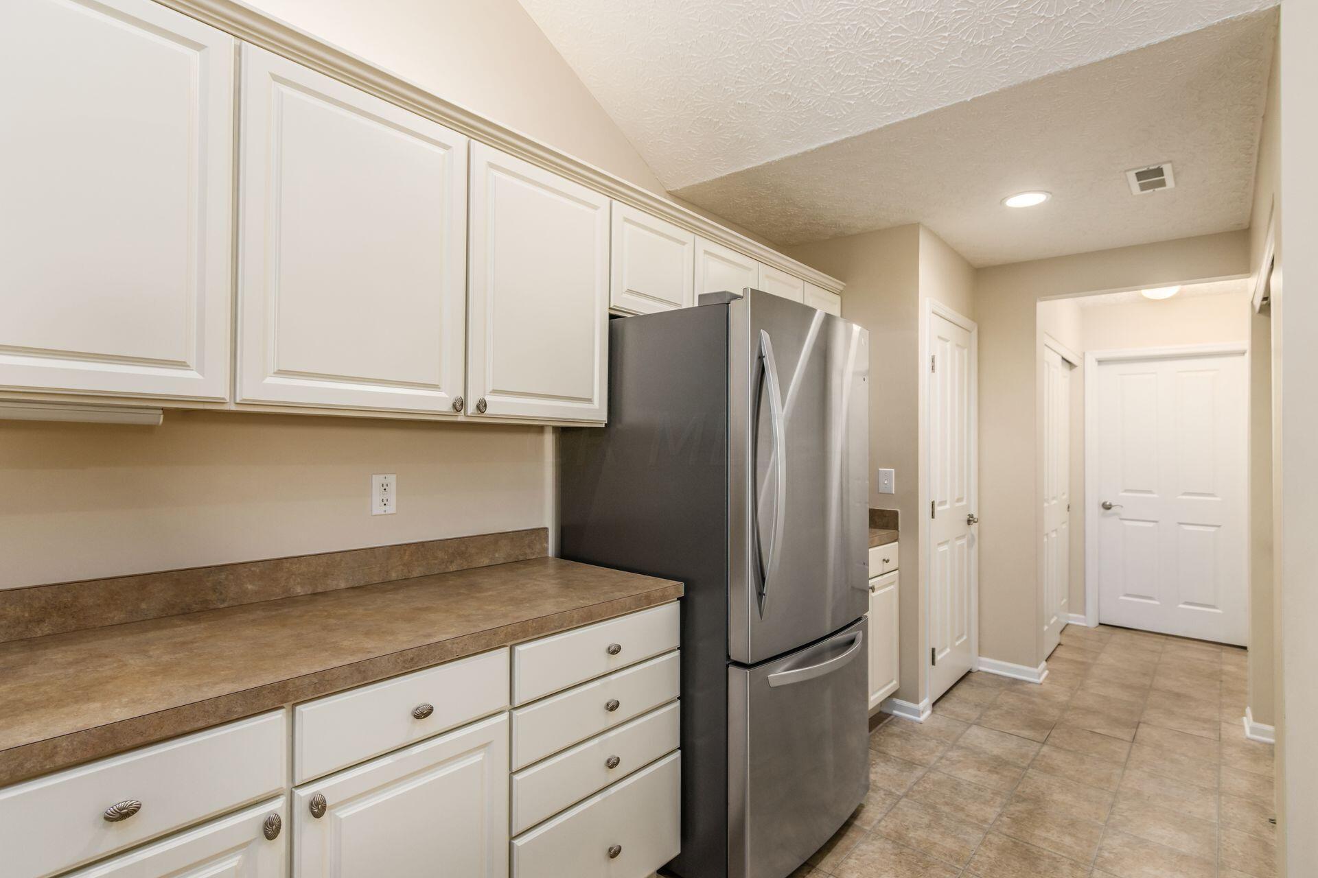 746 Kingsmead Road Westerville, OH 43082 - Photo 9 of 26 Kitchen to Pantry & Utility Space