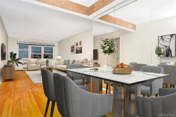 a view of a dining room with furniture and wooden floor