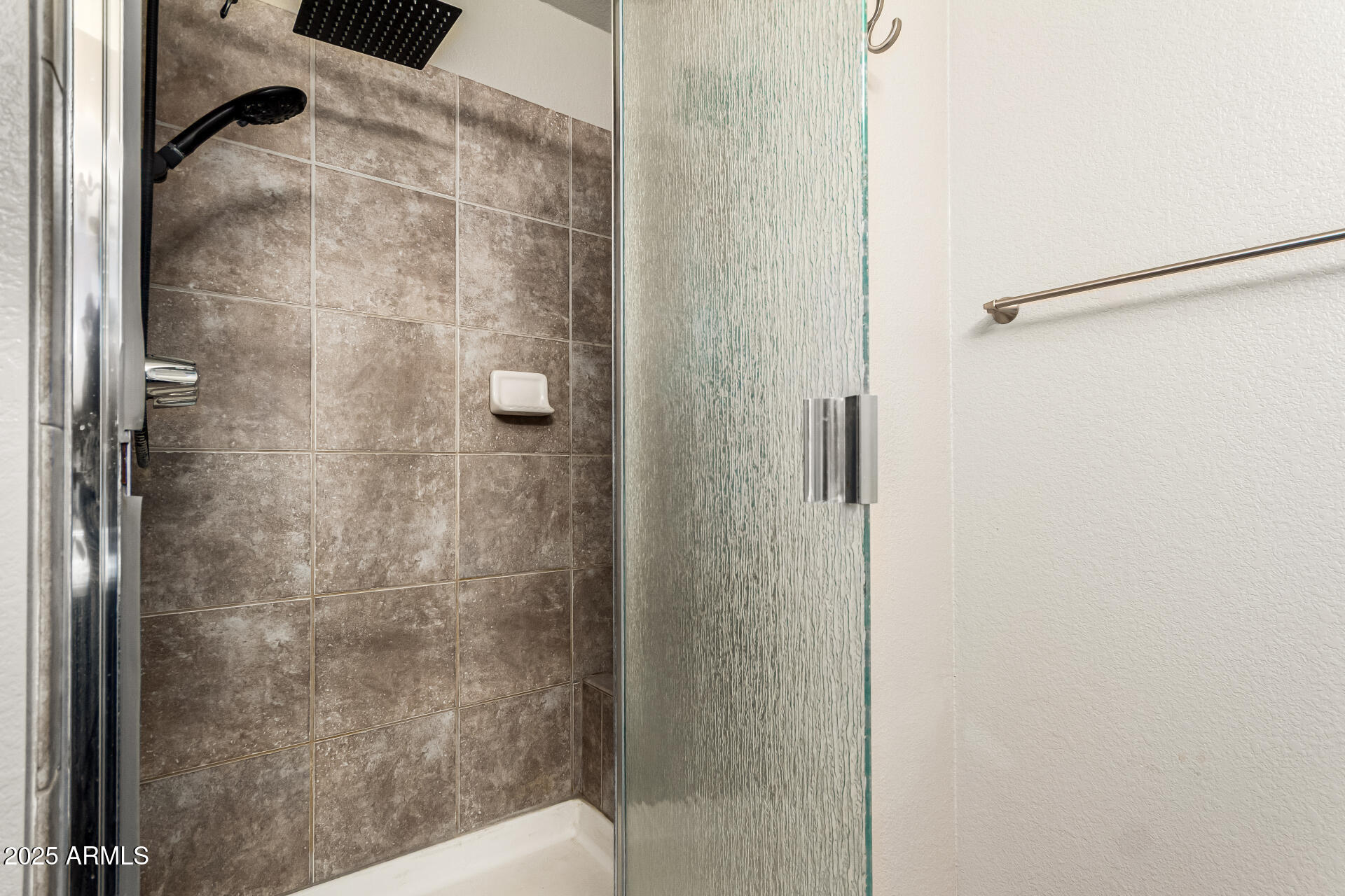 8700 East Mountain View Road, Unit 1014 Scottsdale, AZ 85258 - Photo 16 of 41 a bathroom with a shower