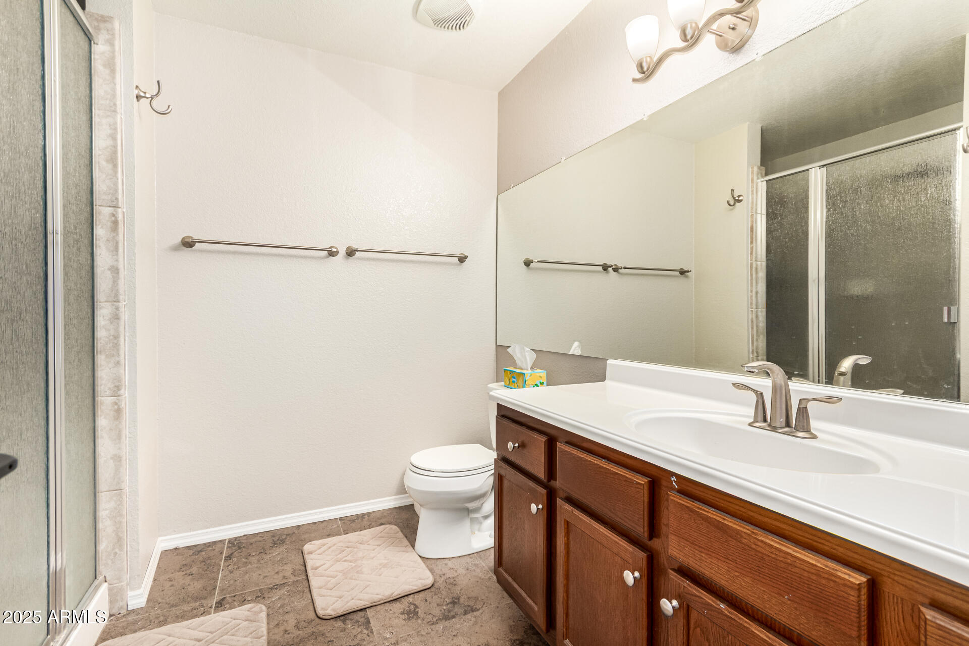 8700 East Mountain View Road, Unit 1014 Scottsdale, AZ 85258 - Photo 17 of 41 a bathroom with a sink toilet and vanity