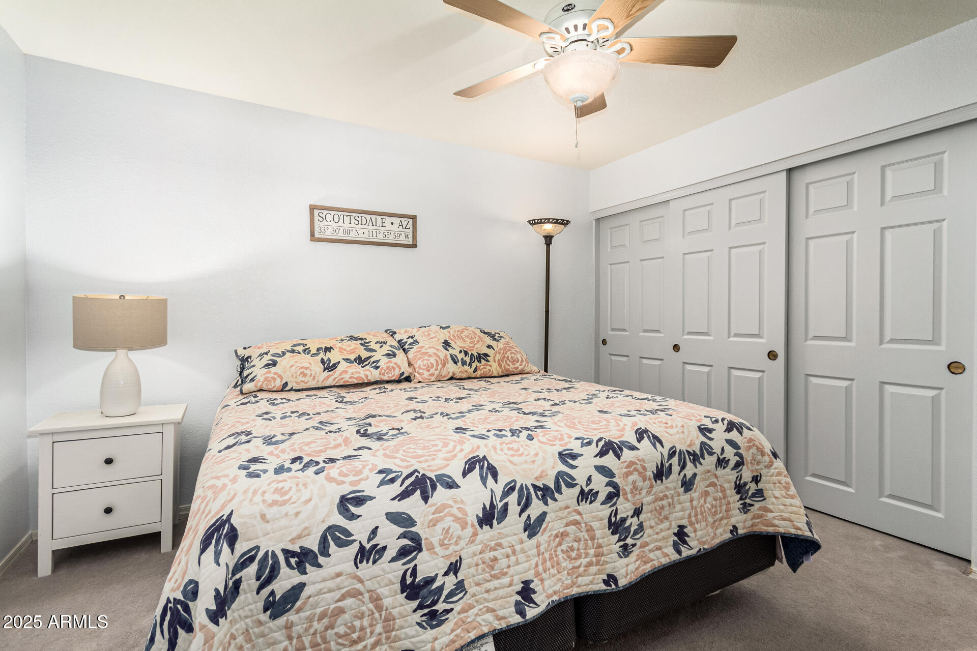 8700 East Mountain View Road, Unit 1014 Scottsdale, AZ 85258 - Photo 19 of 41 a bedroom with a large bed and a window