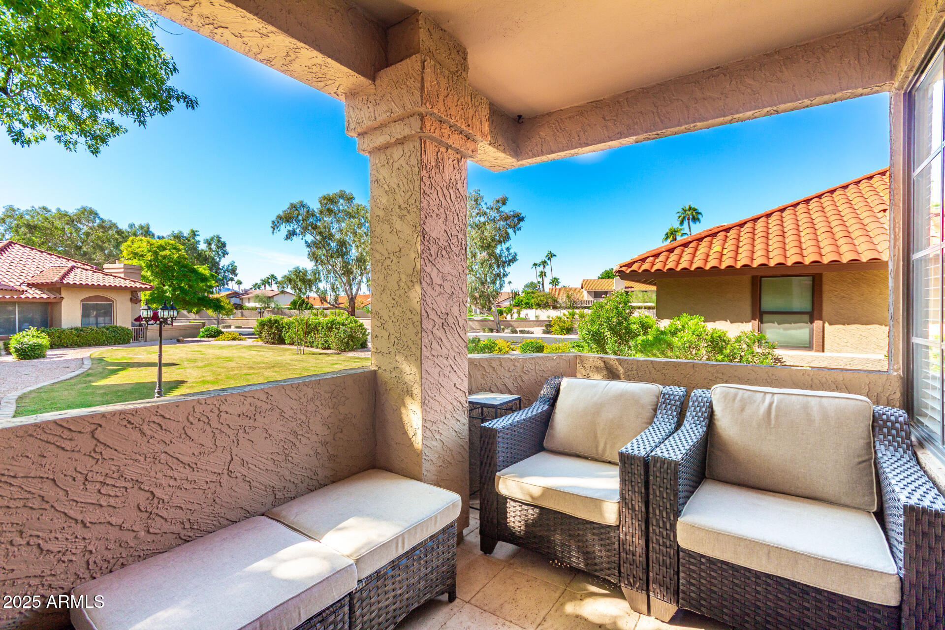 8700 East Mountain View Road, Unit 1014 Scottsdale, AZ 85258 - Photo 23 of 41 a view of a swimming pool with a couches