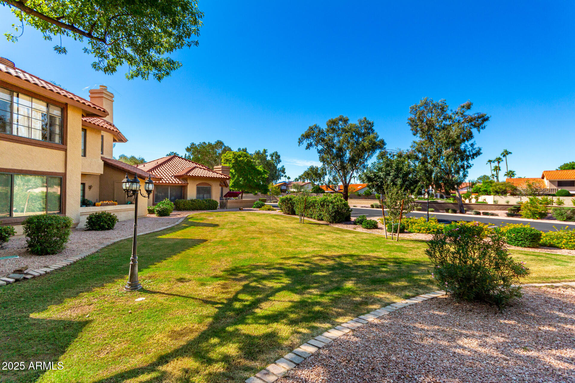 8700 East Mountain View Road, Unit 1014 Scottsdale, AZ 85258 - Photo 32 of 41 a swimming pool with some trees in the background