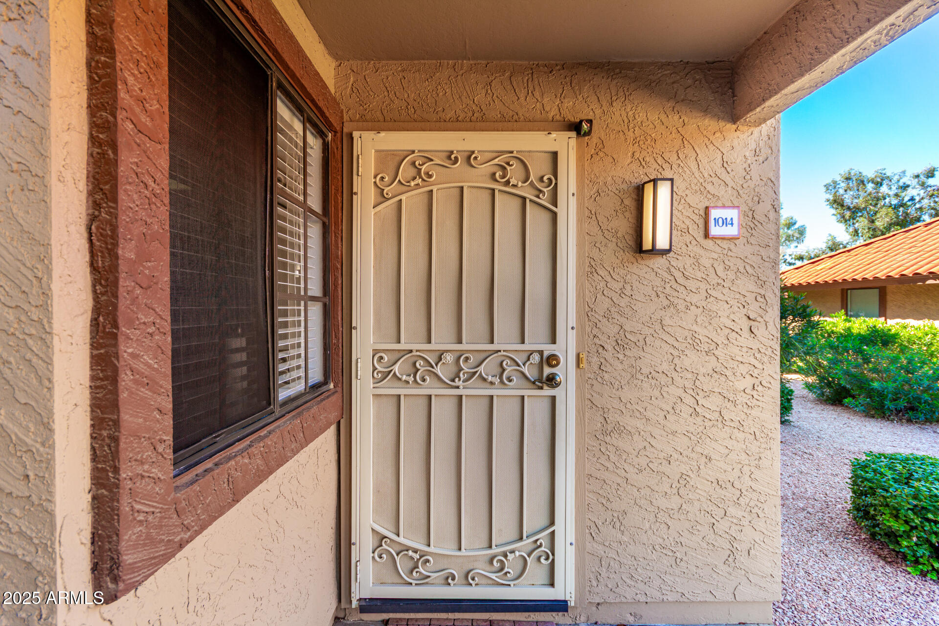 8700 East Mountain View Road, Unit 1014 Scottsdale, AZ 85258 - Photo 33 of 41 a front view of a house with entryway