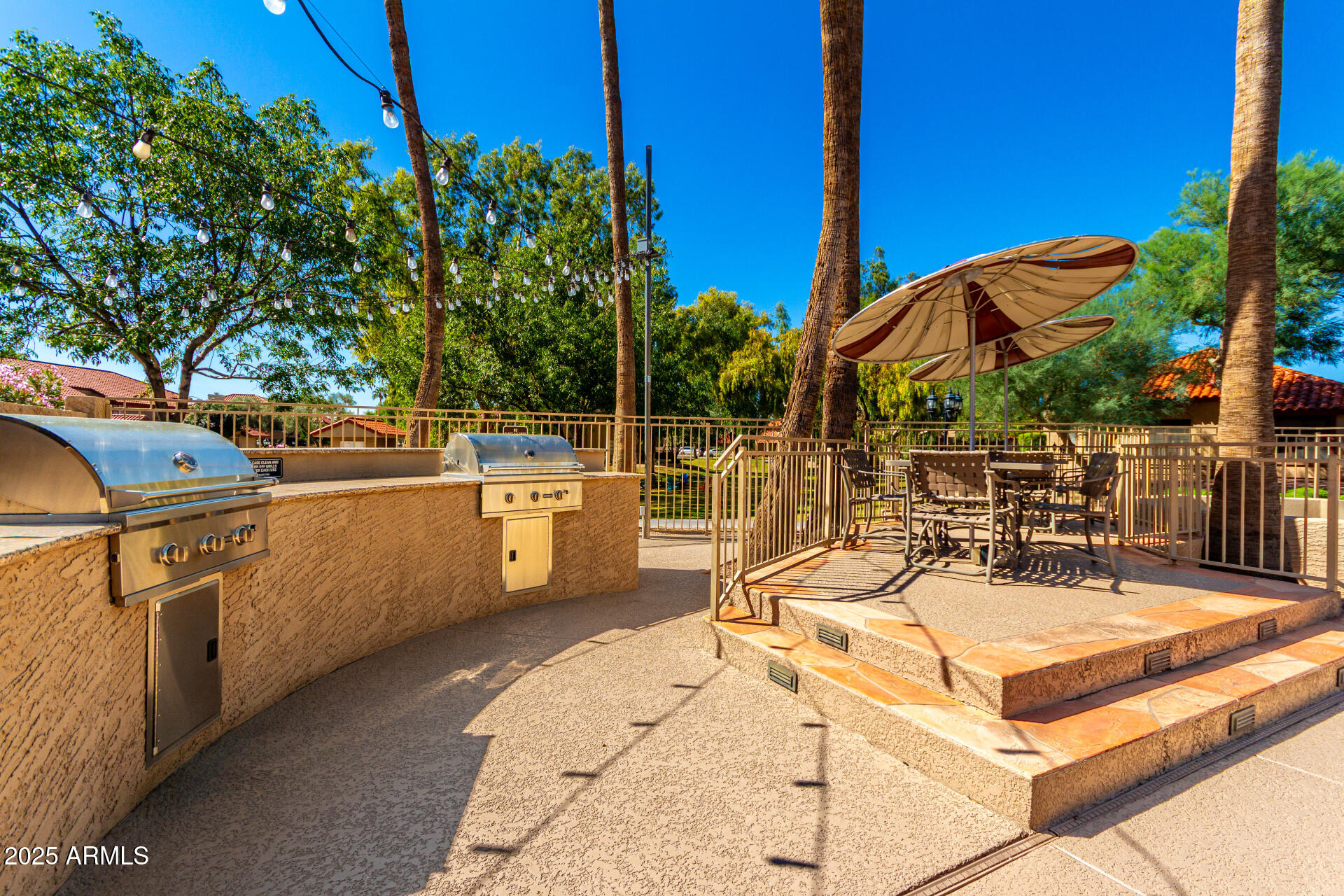 8700 East Mountain View Road, Unit 1014 Scottsdale, AZ 85258 - Photo 34 of 41 a view of a swimming pool with a patio