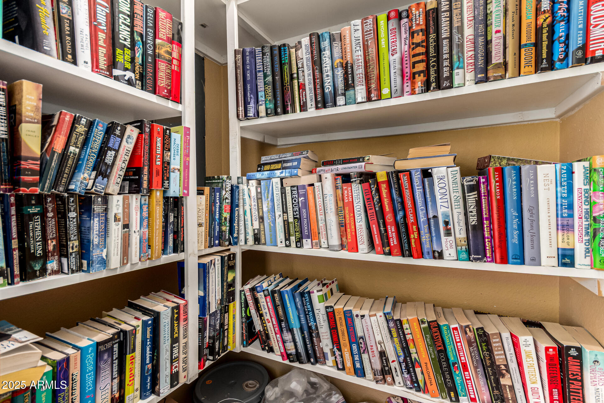 8700 East Mountain View Road, Unit 1014 Scottsdale, AZ 85258 - Photo 38 of 41 a view of walk in closet with clothes and shoes
