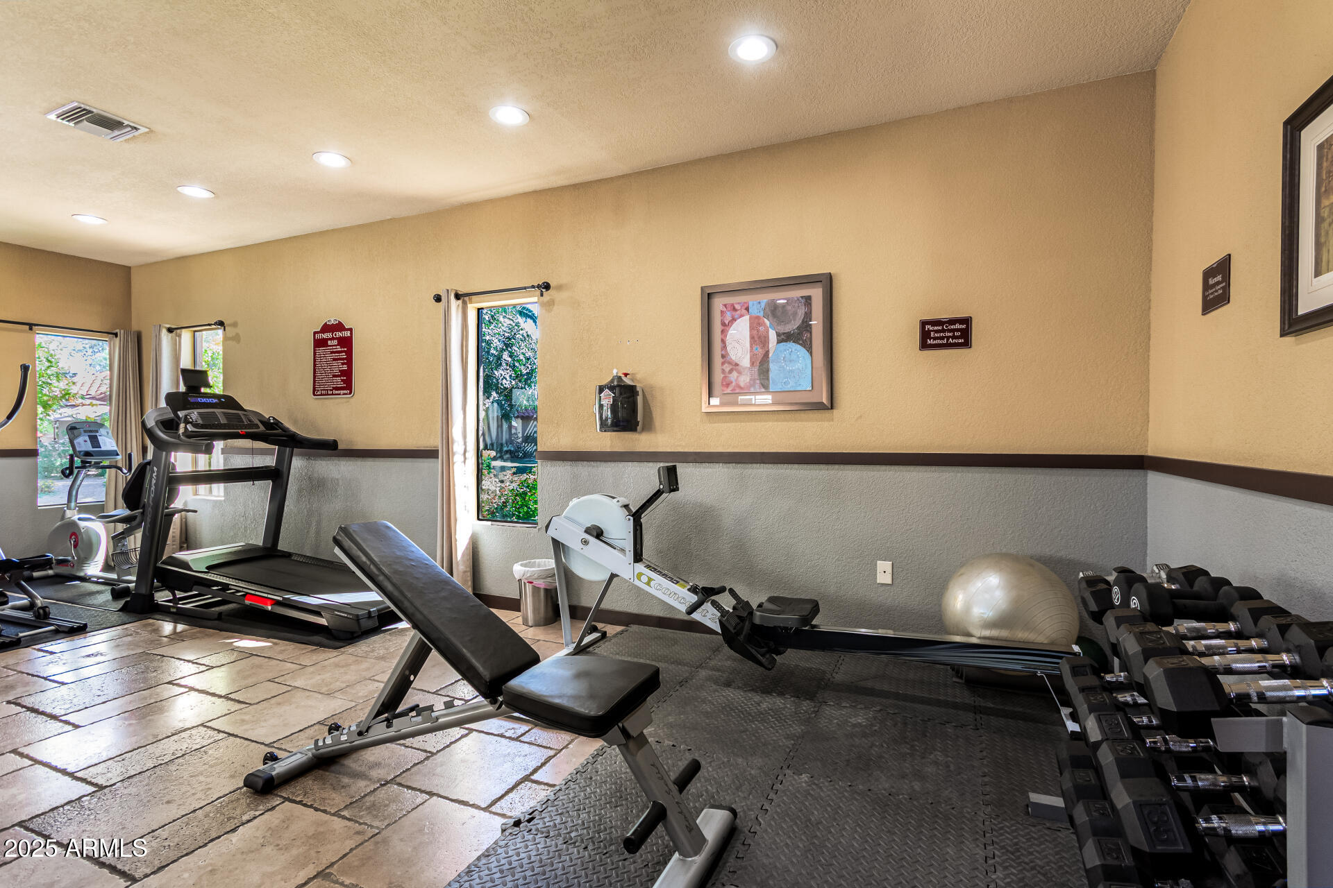 8700 East Mountain View Road, Unit 1014 Scottsdale, AZ 85258 - Photo 4 of 41 a view of a room with gym equipment