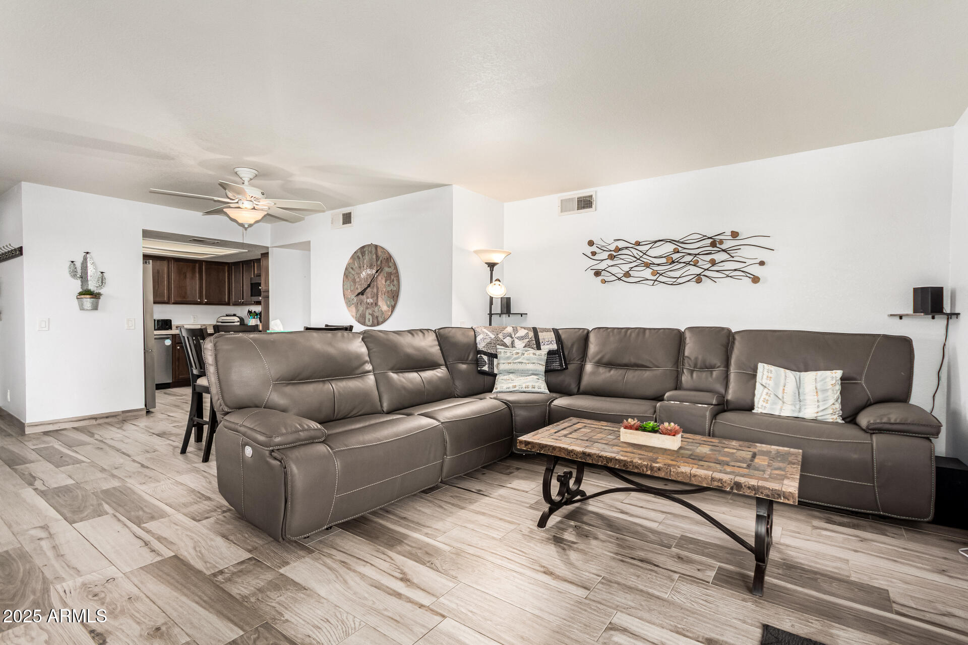 8700 East Mountain View Road, Unit 1014 Scottsdale, AZ 85258 - Photo 6 of 41 a living room with furniture and a rug