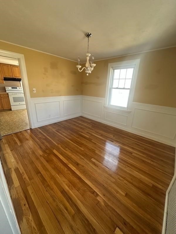 31 Badger Road Boston, MA 02136 - Photo 6 of 19 a view of empty room with wooden floor