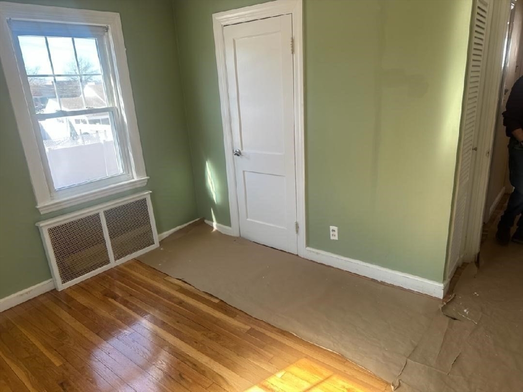31 Badger Road Boston, MA 02136 - Photo 7 of 19 a view of an empty room and wooden floor
