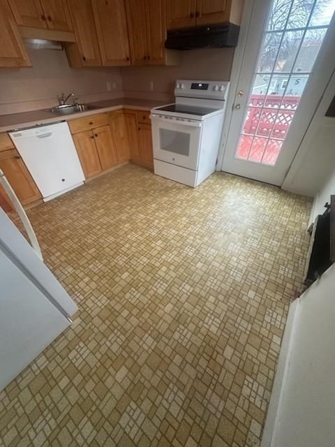31 Badger Road Boston, MA 02136 - Photo 10 of 19 a kitchen with a sink a stove and cabinets
