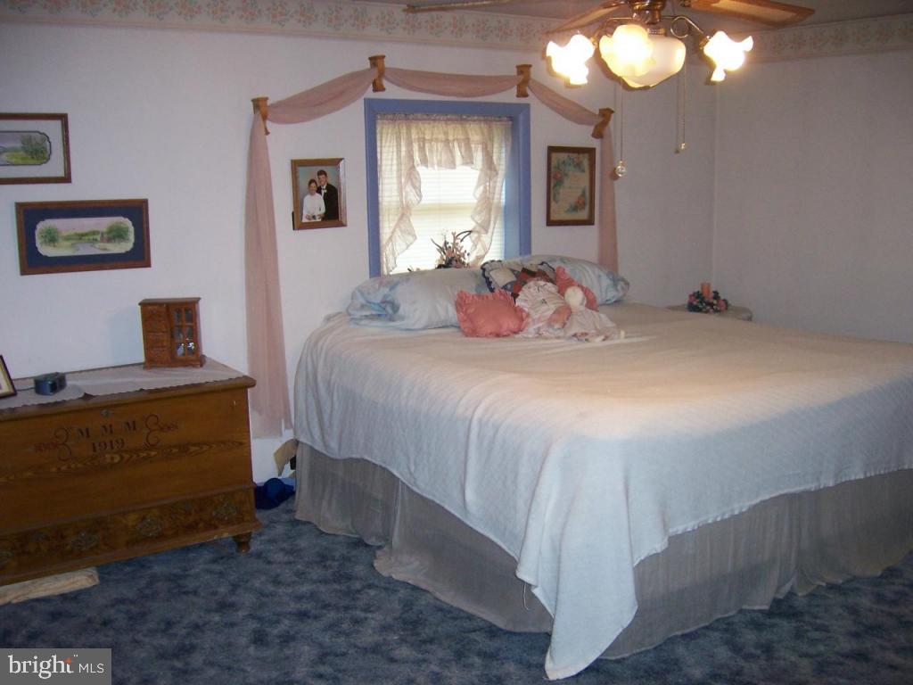 788 Hopeland Road Lititz, PA 17543 - Photo 7 of 7 a bed room with a bed mirror and a window