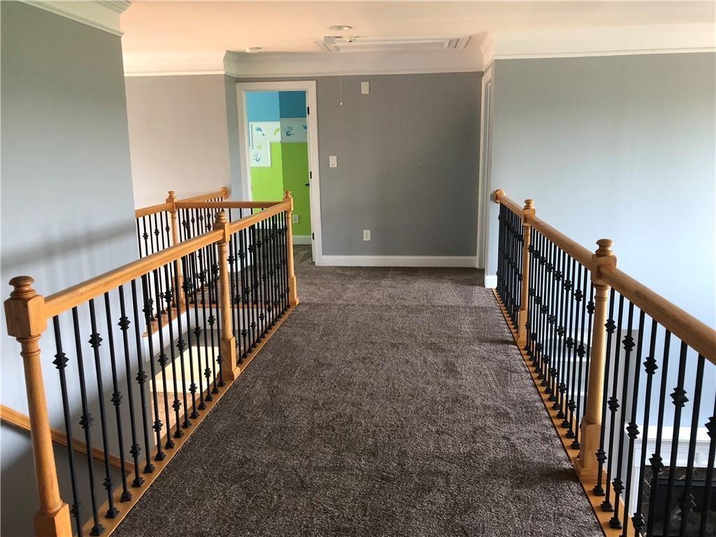 2575 Goodrick Lane Cumming, GA 30041 - Photo 19 of 30 a view of a hallway view with staircase