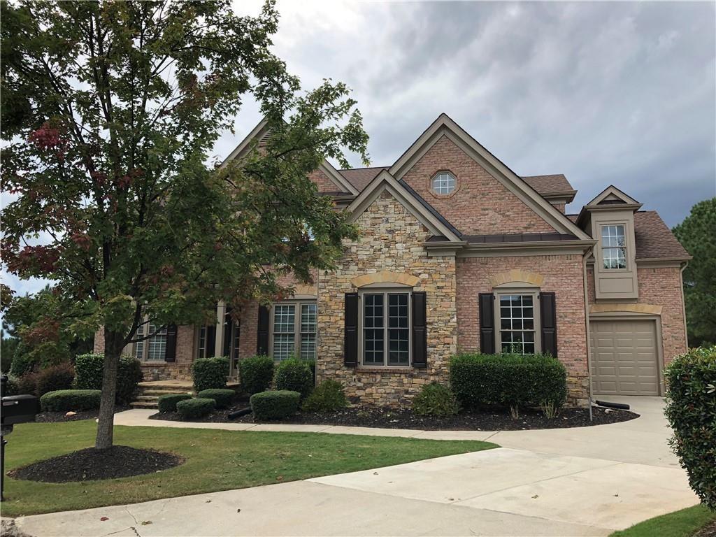 2575 Goodrick Lane Cumming, GA 30041 - Photo 2 of 30 a house view with a outdoor space