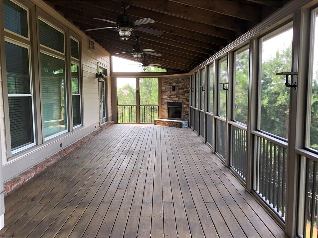 2575 Goodrick Lane Cumming, GA 30041 - Photo 28 of 30 a view of porch with wooden floor