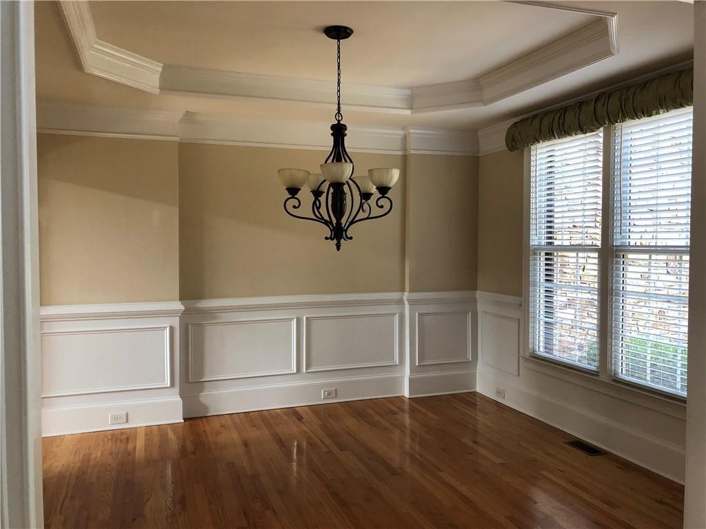 2575 Goodrick Lane Cumming, GA 30041 - Photo 7 of 30 a view of an empty room with a window