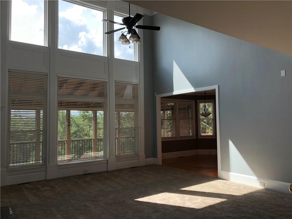 2575 Goodrick Lane Cumming, GA 30041 - Photo 8 of 30 a view of empty room with windows