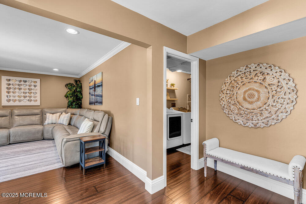 103 Starlight Road Howell, NJ 07731 - Photo 16 of 37 a living room with furniture and wooden floor