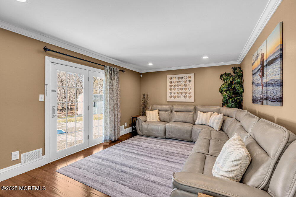 103 Starlight Road Howell, NJ 07731 - Photo 19 of 37 a living room with furniture and a window