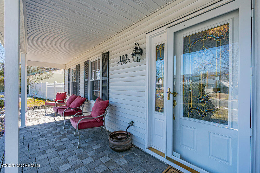 103 Starlight Road Howell, NJ 07731 - Photo 2 of 37 a view of a two chairs in the balcony