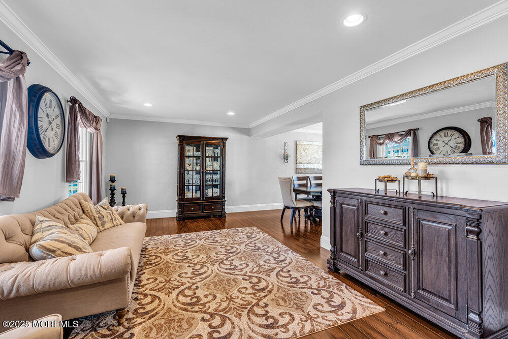 103 Starlight Road Howell, NJ 07731 - Photo 5 of 37 a living room with furniture a wooden floor and window