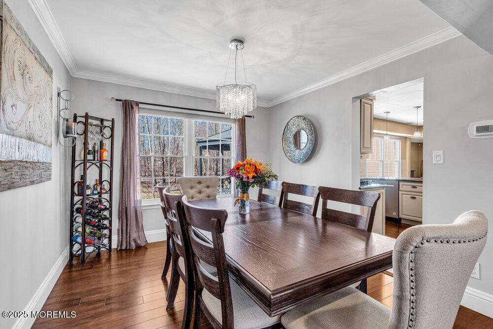 103 Starlight Road Howell, NJ 07731 - Photo 9 of 37 a view of a dining room with furniture window and wooden floor