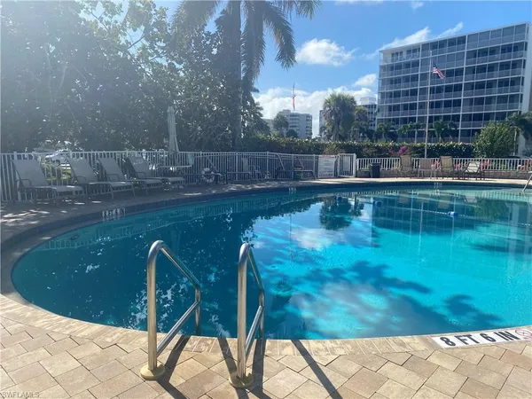 a view of swimming pool from a yard