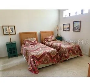 a view of a dining room with furniture wooden floor and a chandelier