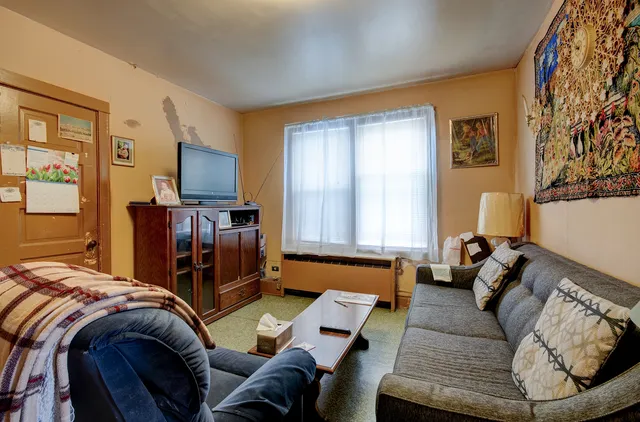 a bed room with a bed and a couch