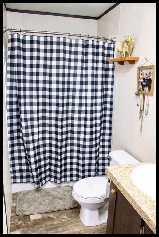 18200 Highway 6 Dublin, TX 76446 - Photo 15 of 38 a bathroom with a sink and a toilet