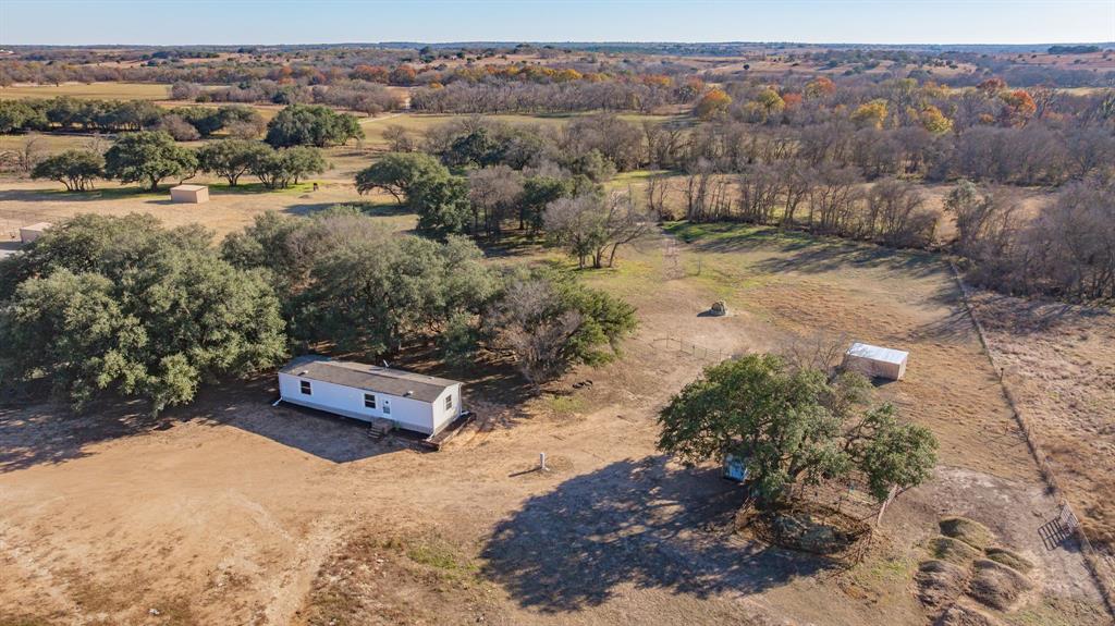 18200 Highway 6 Dublin, TX 76446 - Photo 4 of 38 an aerial view of a house with a yard