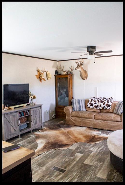 18200 Highway 6 Dublin, TX 76446 - Photo 10 of 38 a bedroom with a bed and a flat screen tv