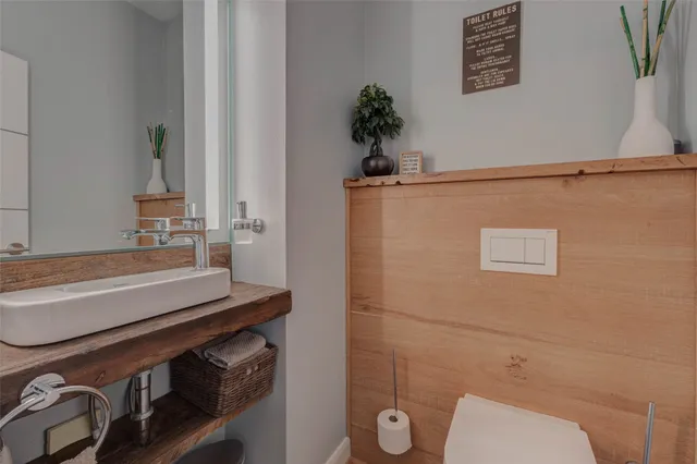 a bathroom with a shower and toilet
