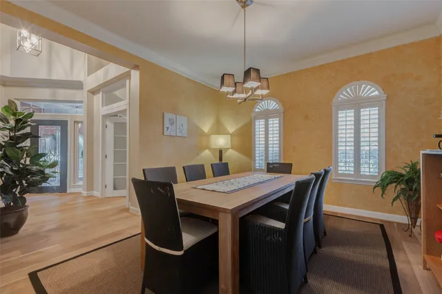 a kitchen with granite countertop a refrigerator and a sink