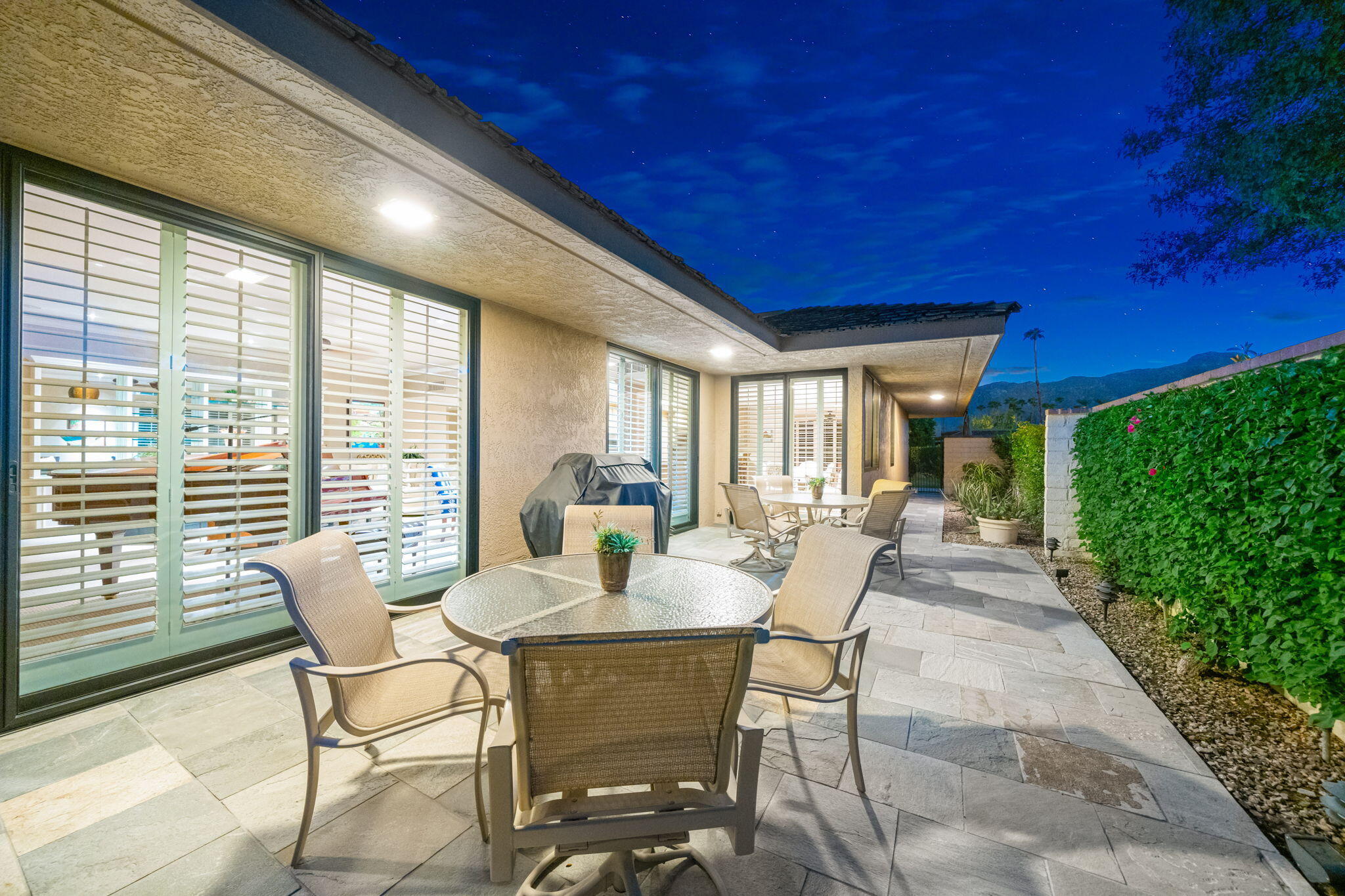 6 Oxford Court Rancho Mirage, CA 92270 - Photo 30 of 42 a dining room with furniture and wooden floor