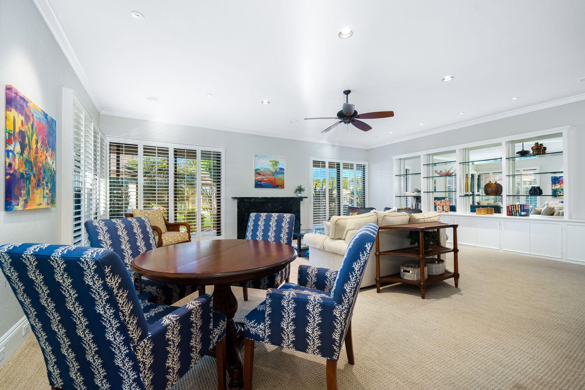 6 Oxford Court Rancho Mirage, CA 92270 - Photo 4 of 42 a view of a dining room with furniture and a large window