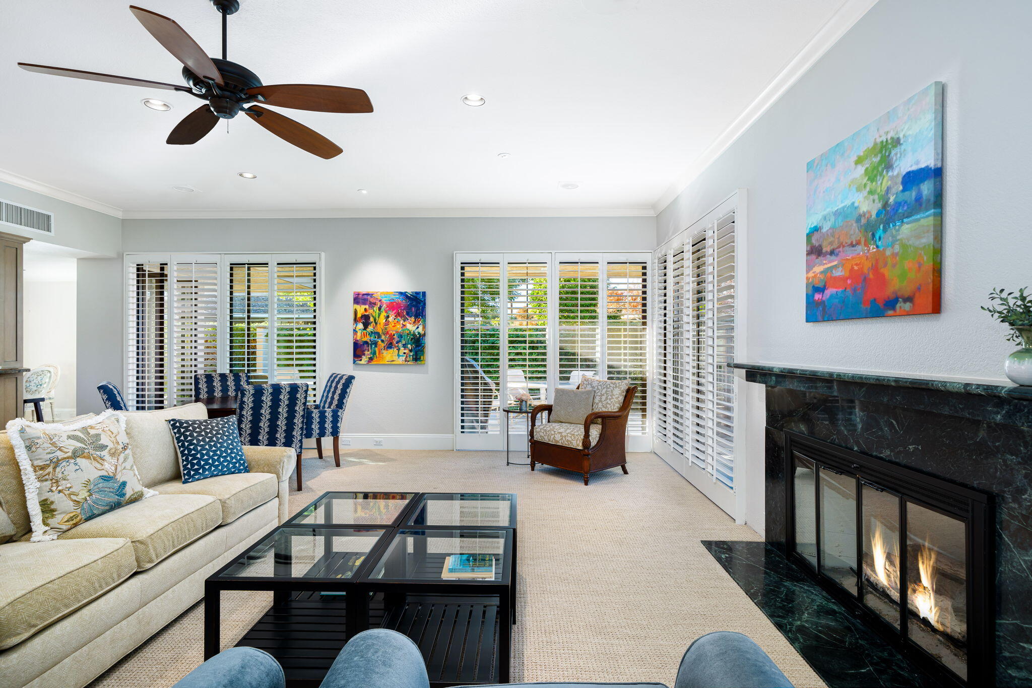 6 Oxford Court Rancho Mirage, CA 92270 - Photo 6 of 42 a living room with furniture and a fireplace