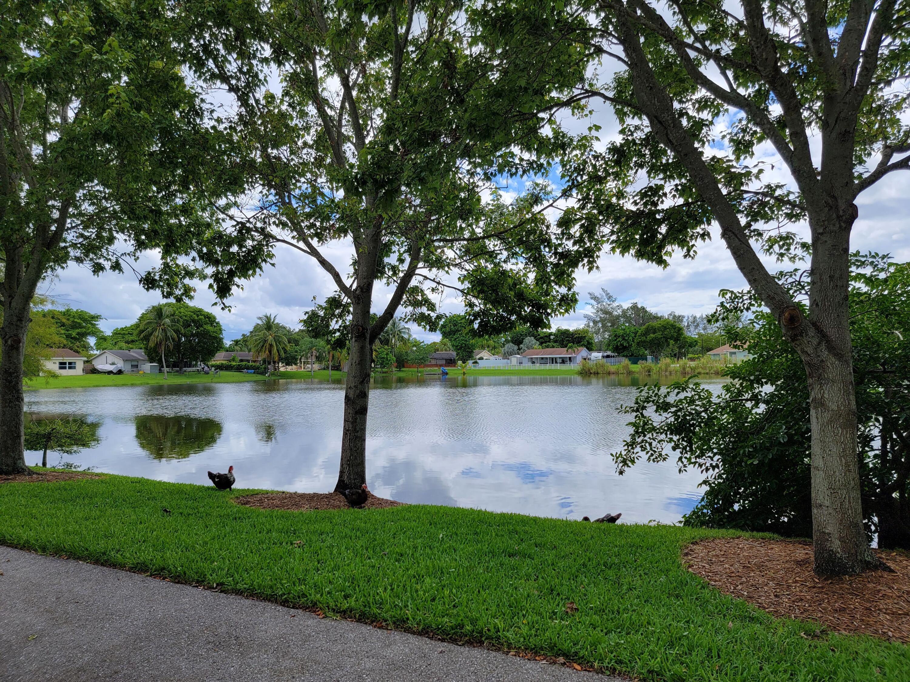 9682 Ohio Place Boca Raton, FL 33434 - Photo 30 of 37 a view of a lake from a yard